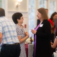 faculty sitting and standing